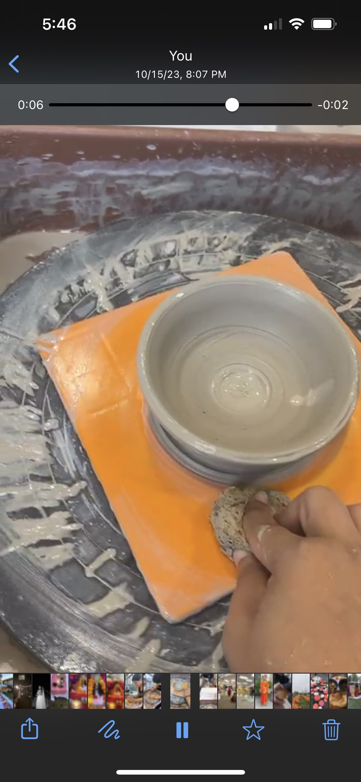 Freshly thrown bowl on a pottery wheel